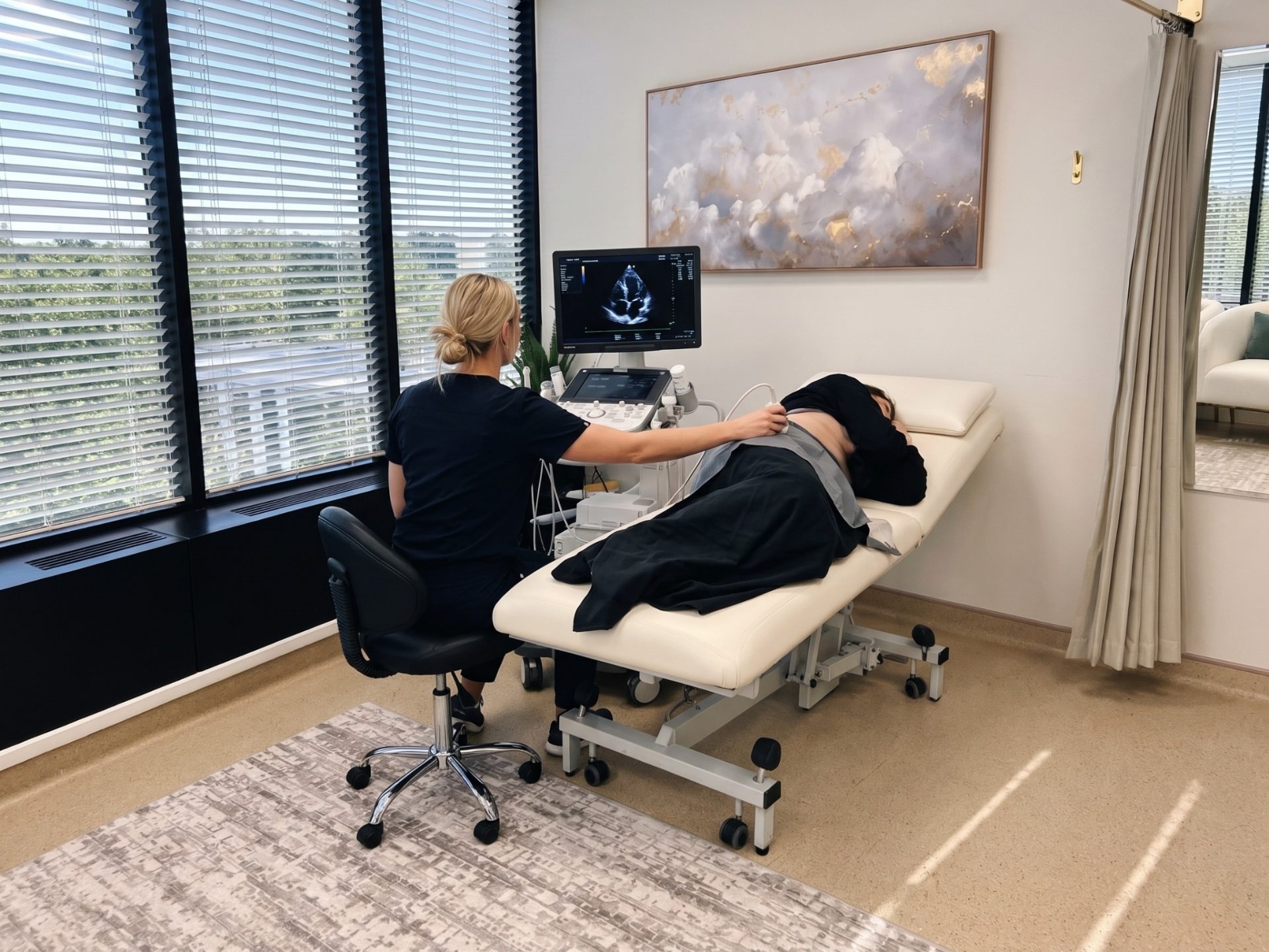Keli performing an echocardiogram at MedHealth Ultrasound